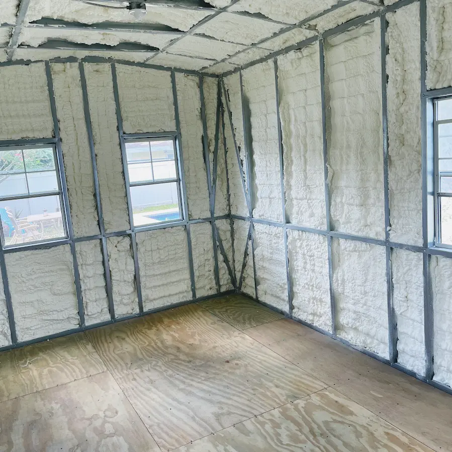 Closed-cell spray foam insulation applied to wall cavities in a residential project in Eagle